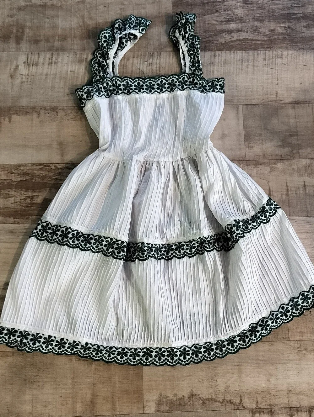 White Girls' Tiered Dress with Black Floral Trim